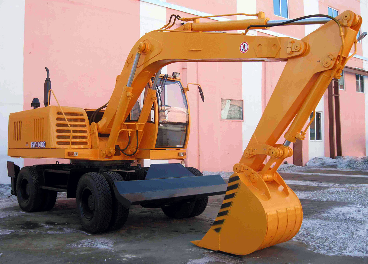Услуги по аренде экскаватора колесного Амкодор EW1400 в Бресте и Брестской области по низким ценам